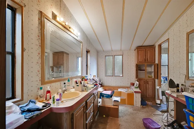 a very nice looking dining room with a large window