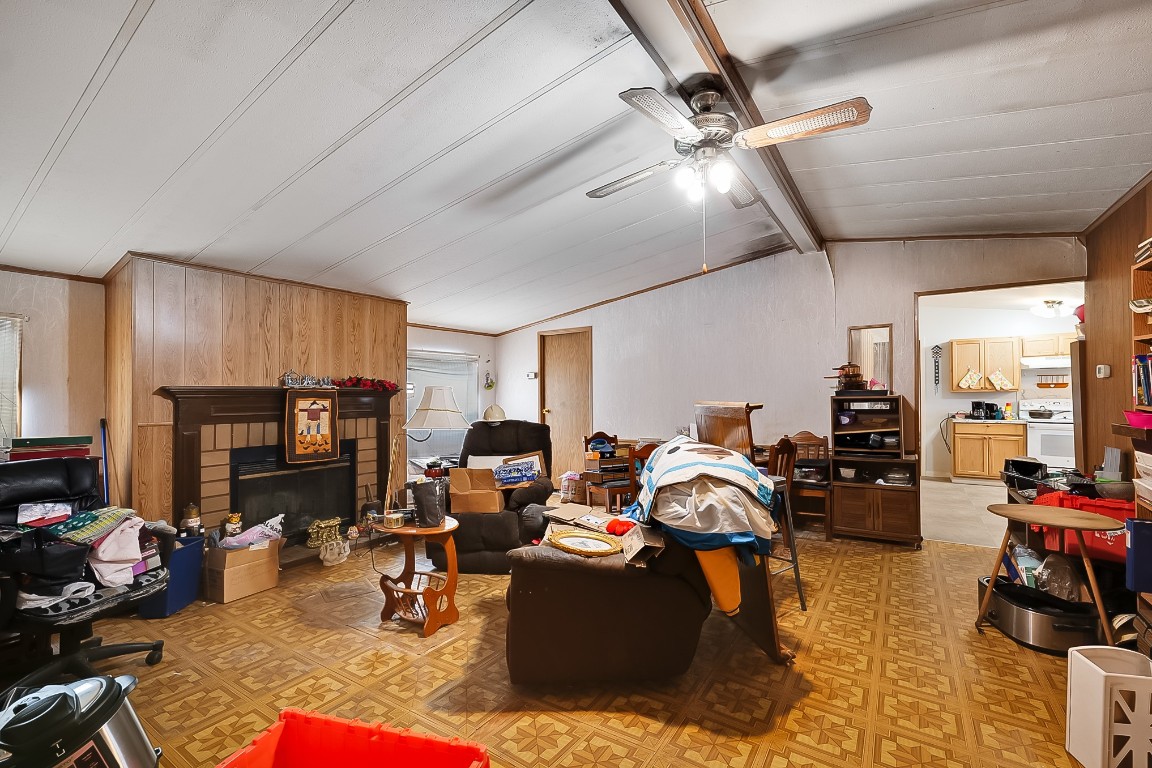 85110 Theresa Road Yulee, FL 32097 - Photo 3 of 24 a living room with furniture and a fireplace