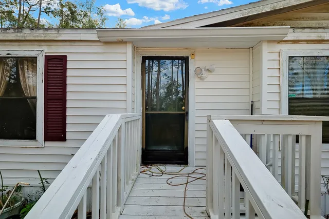 a balcony with view of wooden balcony
