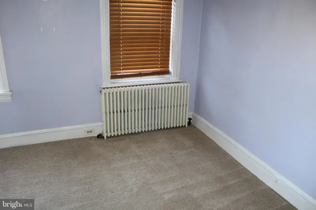 a view of a room with a window