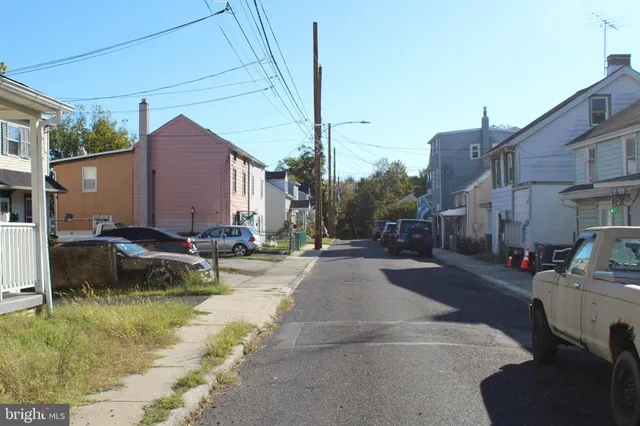 a view of a street with cars