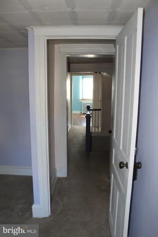 a view of a livingroom from dining room
