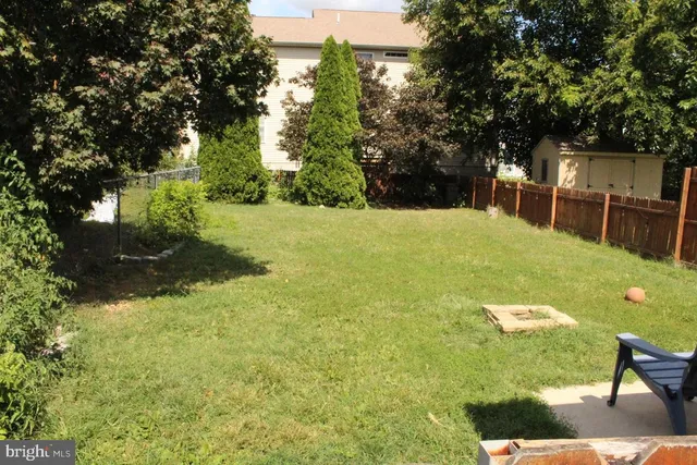 a view of outdoor space and yard