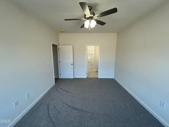 a bathroom with a sink vanity and mirror