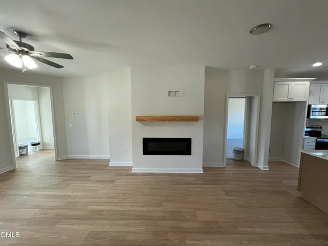 a view of kitchen with wooden floor