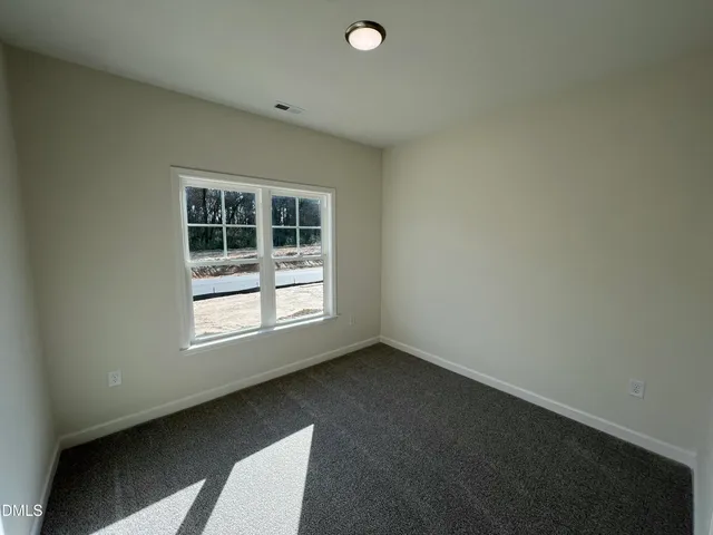 a view of an empty room and a gallery