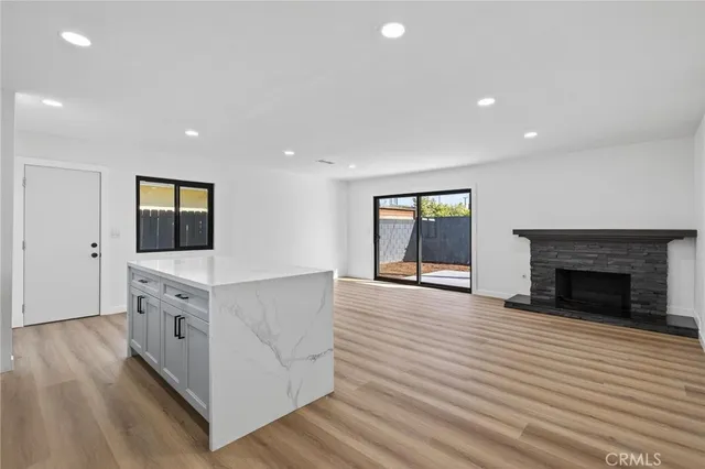 a view of living room with furniture and flat screen tv