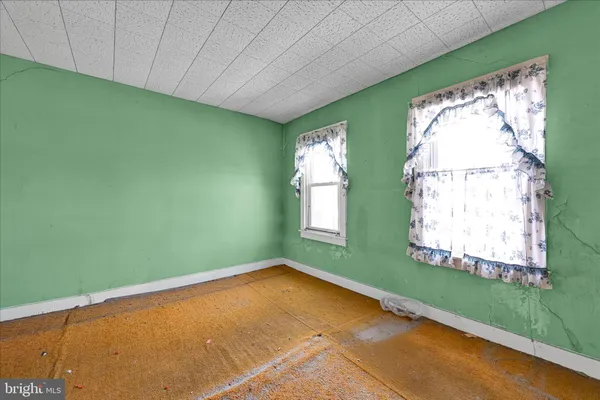 a view of a room that has a window