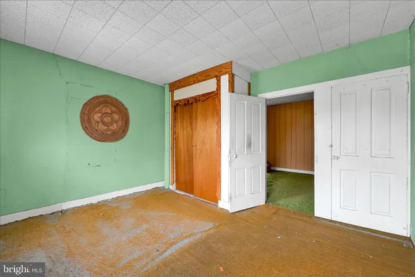 a view of a room with a fan