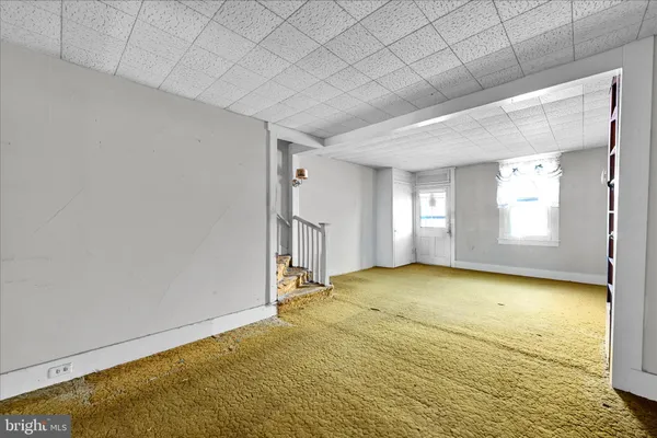 a view of an empty room with window