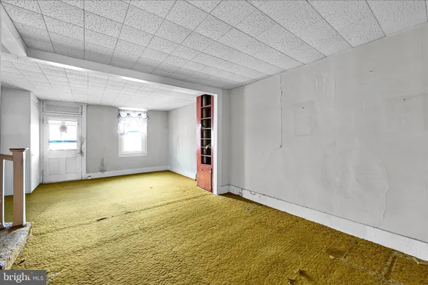 a view of an empty room with window