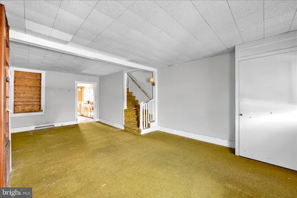 a view of an empty room with window
