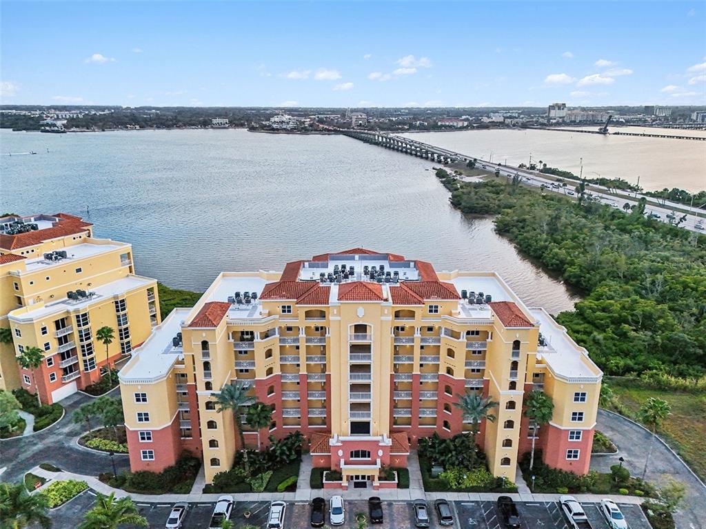 611 Riviera Dunes Way, Unit 102 Palmetto, FL 34221 - Photo 14 of 16 a front view of a building with lake view