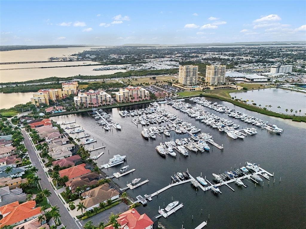 611 Riviera Dunes Way, Unit 102 Palmetto, FL 34221 - Photo 34 of 34 an aerial view of residential building with outdoor space