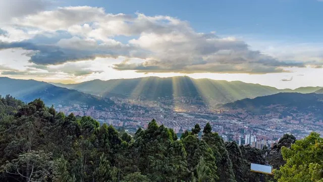 an aerial view of a house with a yard patio and balcony