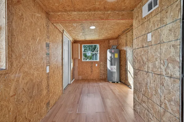a view of entryway with wooden floor