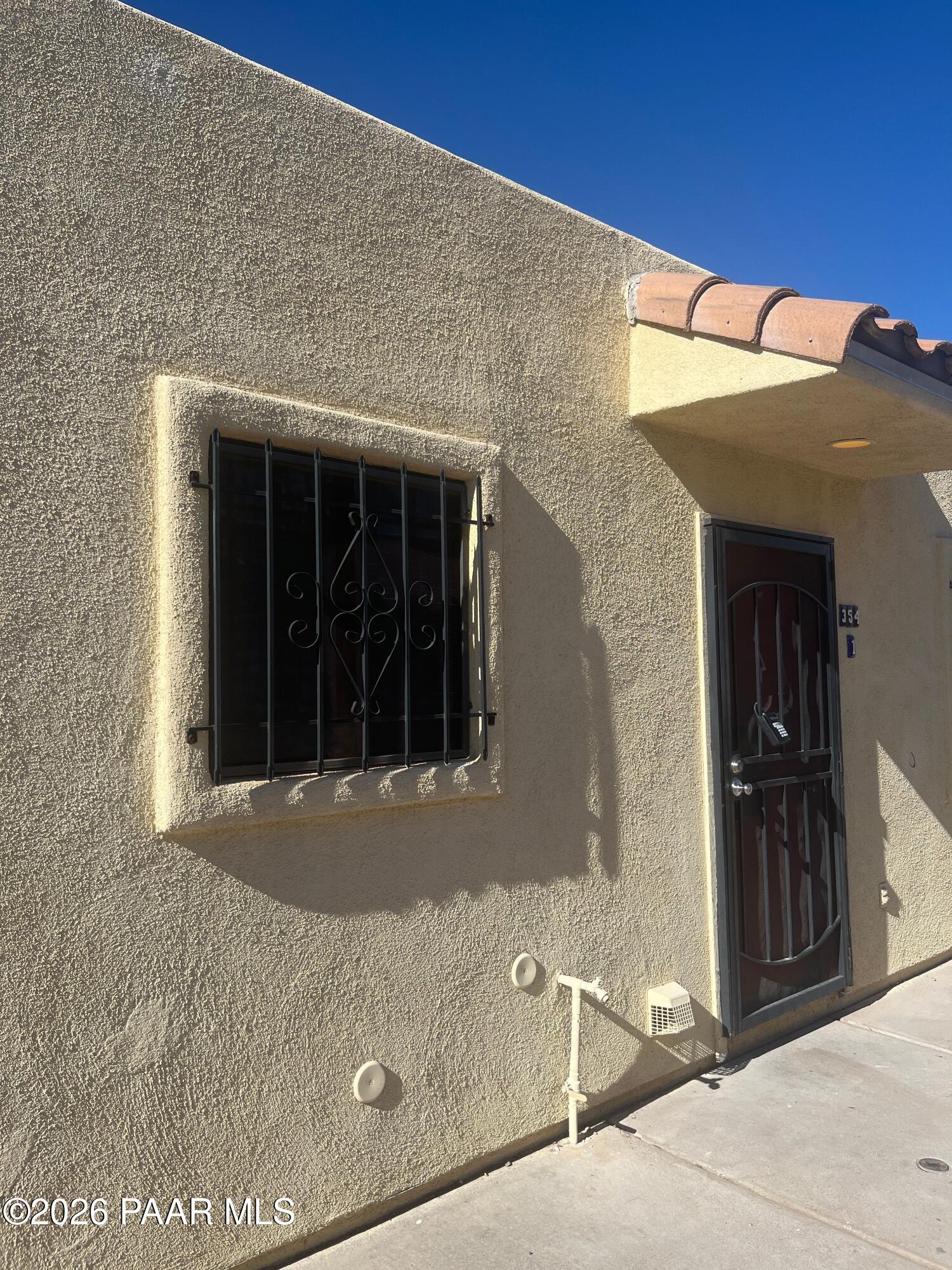 354 West Delano Street, Unit 1 Tucson, AZ 85705 - Photo 18 of 18 front view of a house with a window