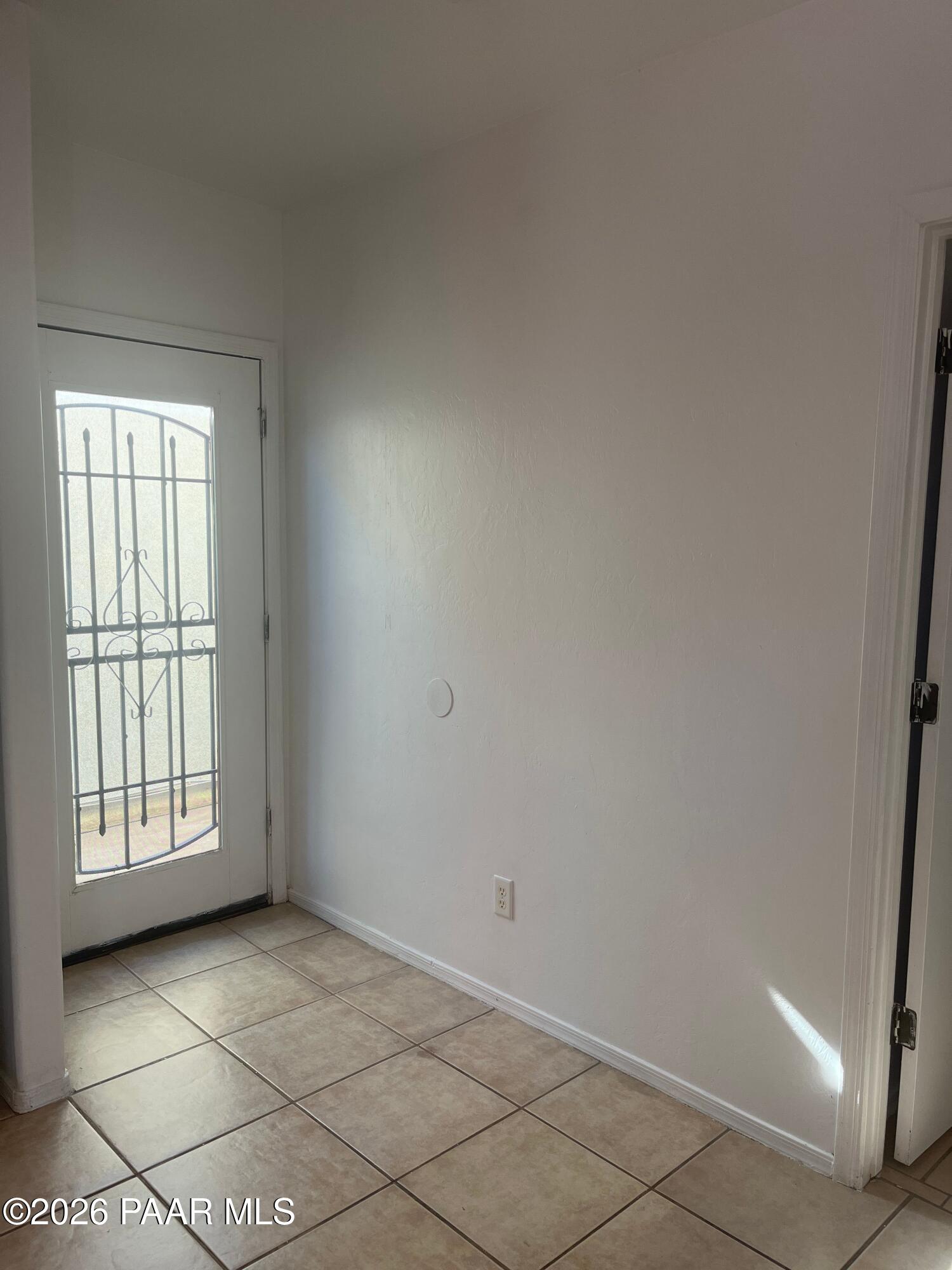 354 West Delano Street, Unit 1 Tucson, AZ 85705 - Photo 2 of 18 a view of an empty room and window