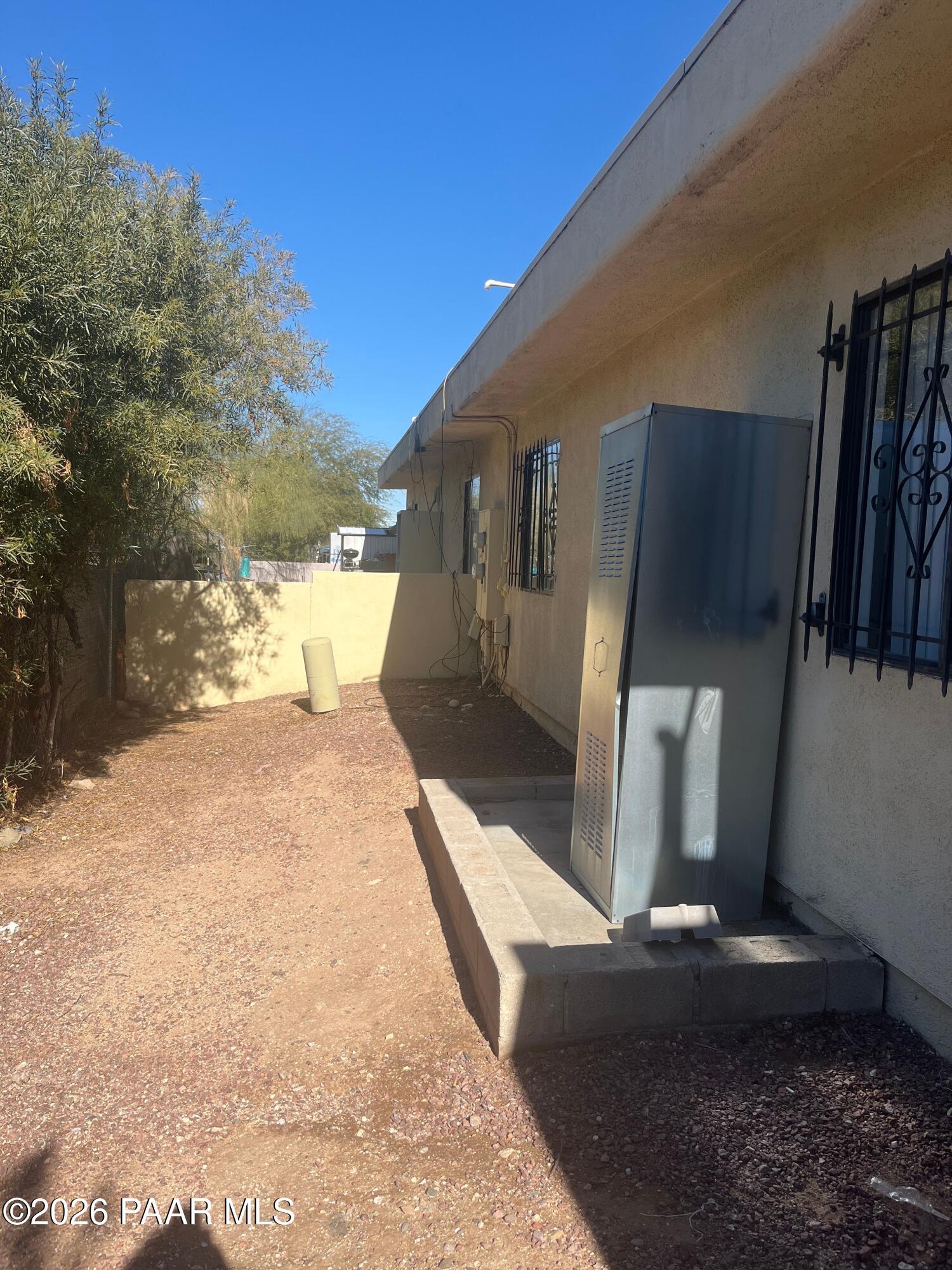 354 West Delano Street, Unit 1 Tucson, AZ 85705 - Photo 7 of 18 a view of a back yard of the house