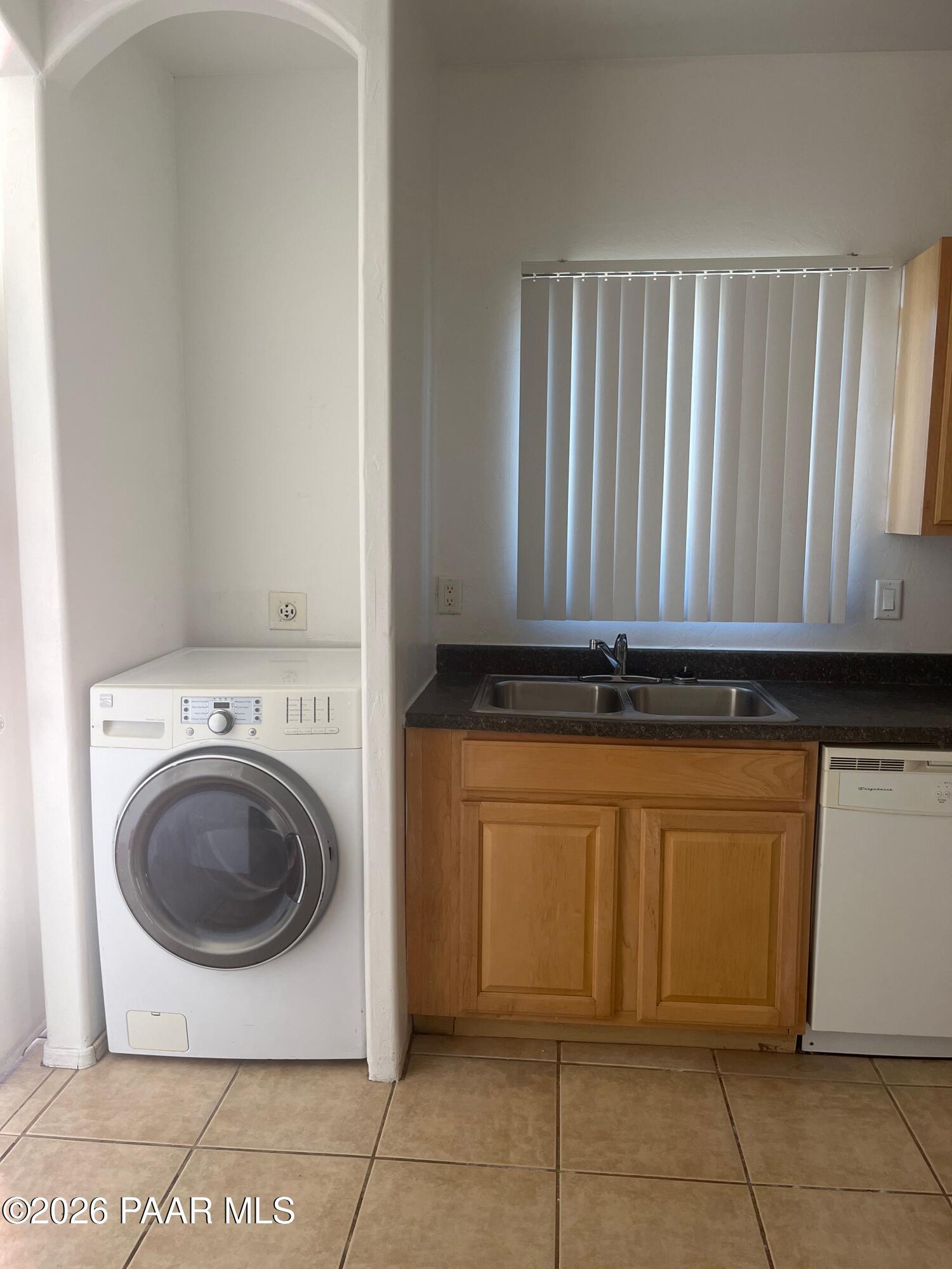 354 West Delano Street, Unit 1 Tucson, AZ 85705 - Photo 9 of 18 a view of a washer and dryer