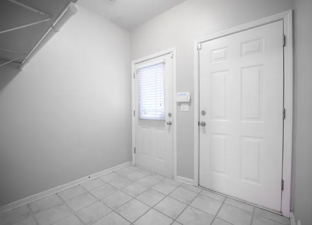 an empty room with windows