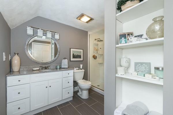 3 Glendale Road Boxford, MA 01921 - Photo 23 of 30 a bathroom with a toilet a sink and a mirror