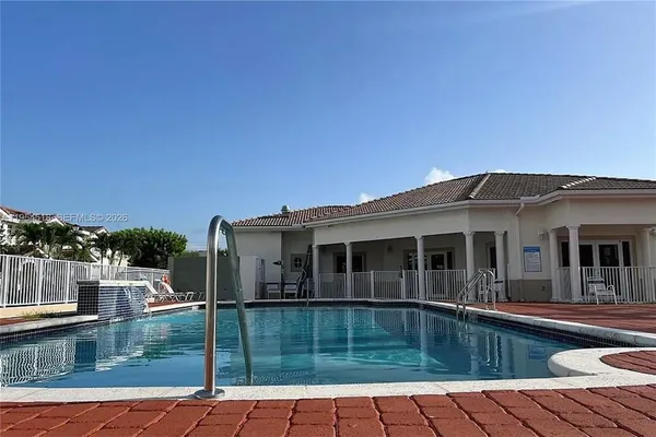 a view of a house with a swimming pool