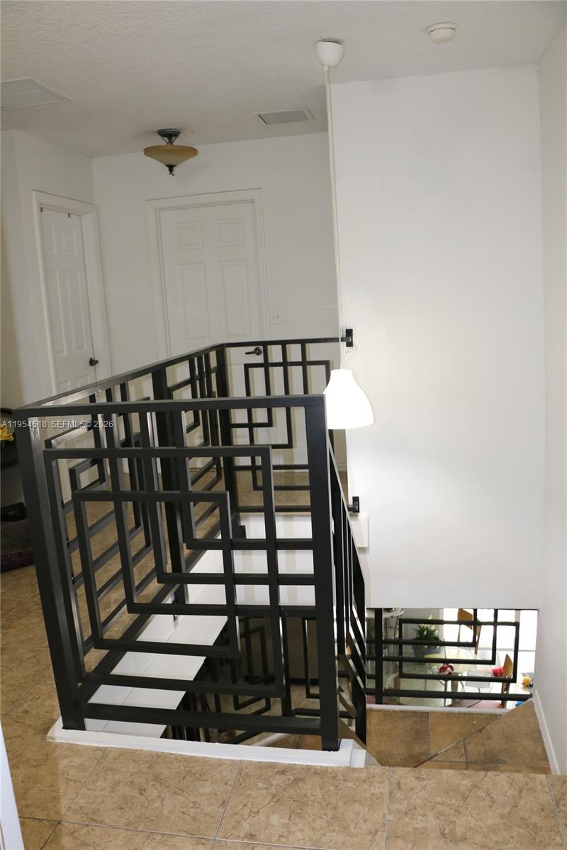 13990 Southwest 260th Street, Unit 13990 Homestead, FL 33032 - Photo 28 of 33 a view of entryway