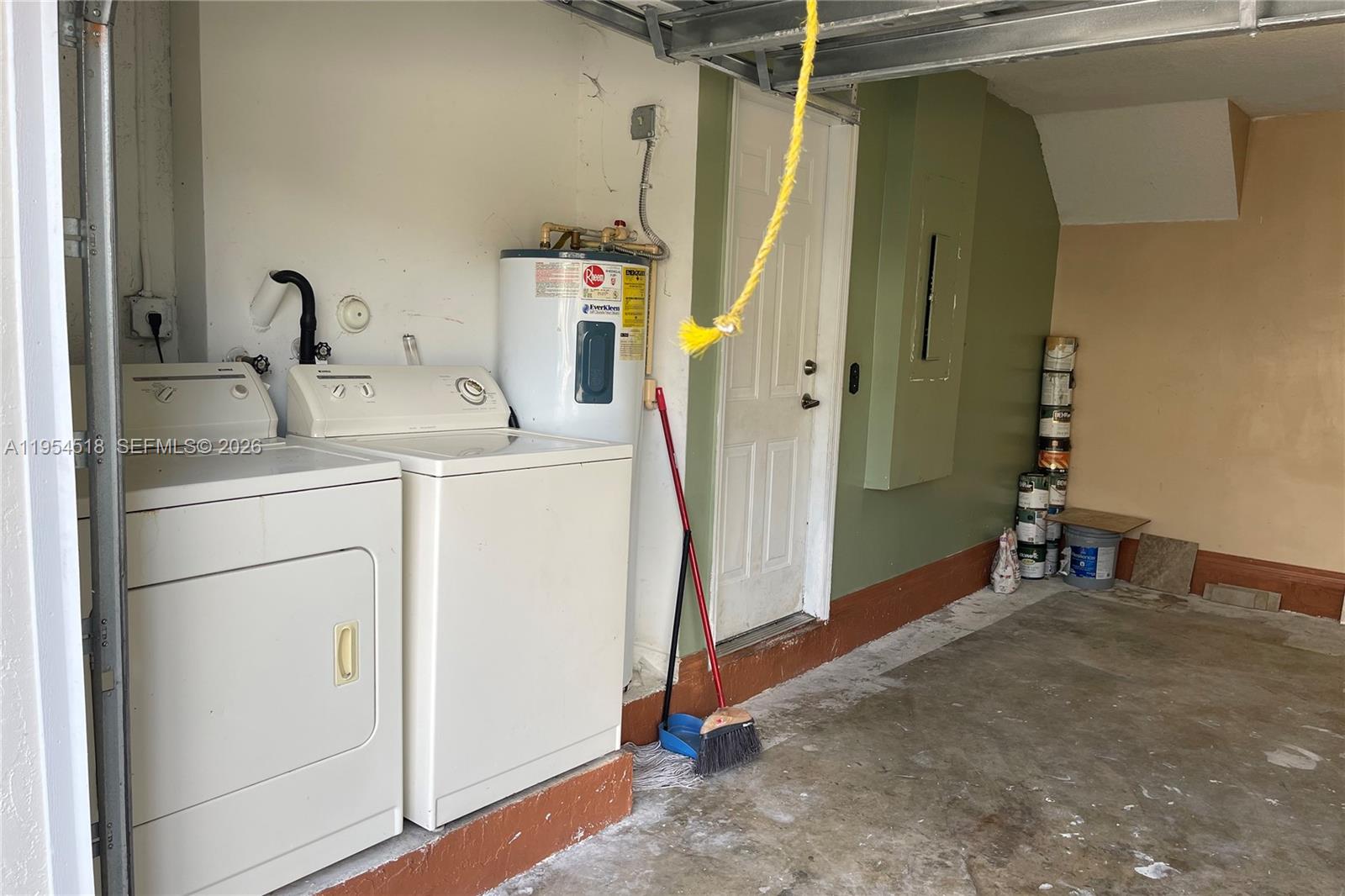 13990 Southwest 260th Street, Unit 13990 Homestead, FL 33032 - Photo 33 of 33 a utility room with dryer and washer