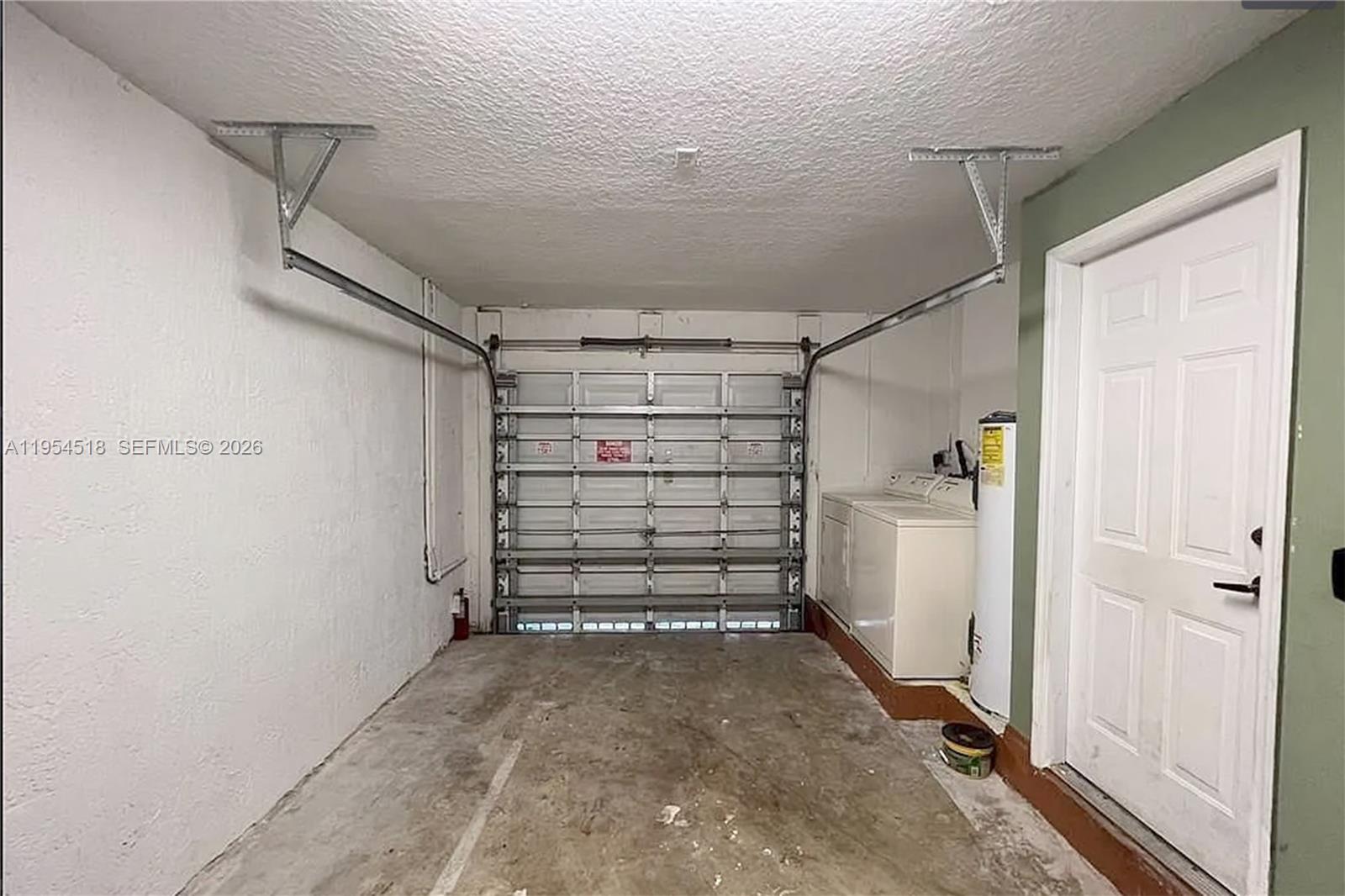 13990 Southwest 260th Street, Unit 13990 Homestead, FL 33032 - Photo 6 of 33 a view of storage and utility room