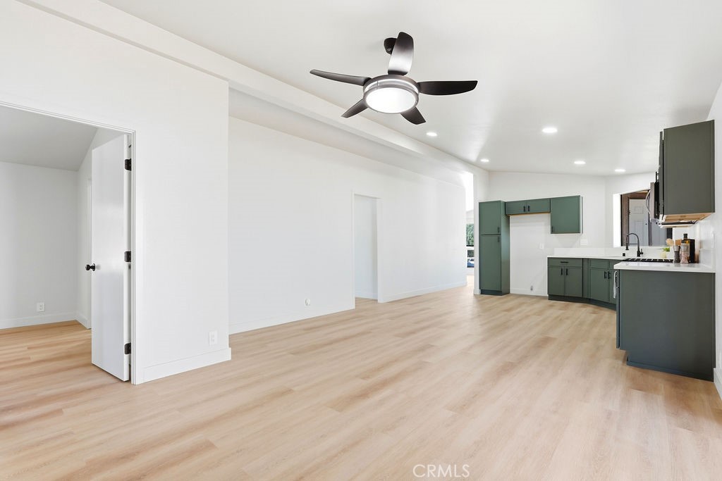 15181 Van Buren, Unit 262 Riverside, CA 92504 - Photo 11 of 48 a view of empty room with wooden floor and ceiling fan