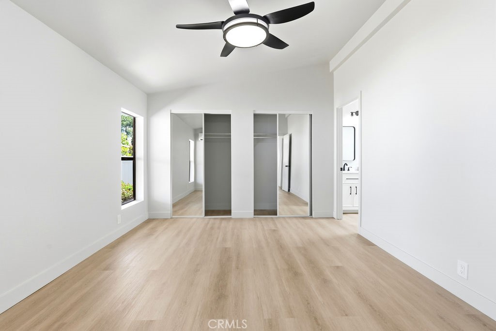 15181 Van Buren, Unit 262 Riverside, CA 92504 - Photo 19 of 48 a view of a room with wooden floor closet and windows