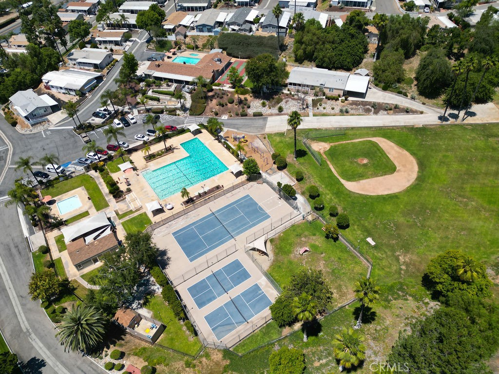 15181 Van Buren, Unit 262 Riverside, CA 92504 - Photo 39 of 48 an aerial view of residential house with outdoor space and swimming pool