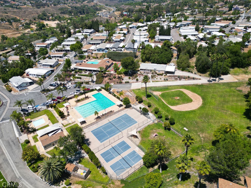 15181 Van Buren, Unit 262 Riverside, CA 92504 - Photo 40 of 48 an aerial view of residential house with outdoor space and swimming pool