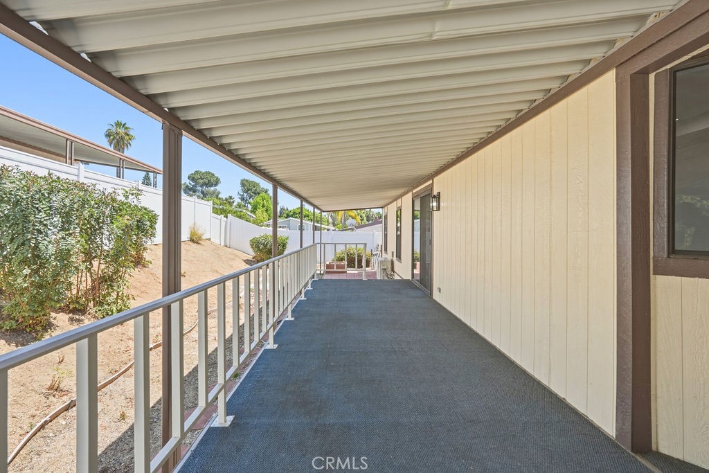 15181 Van Buren, Unit 262 Riverside, CA 92504 - Photo 42 of 48 a view of a porch