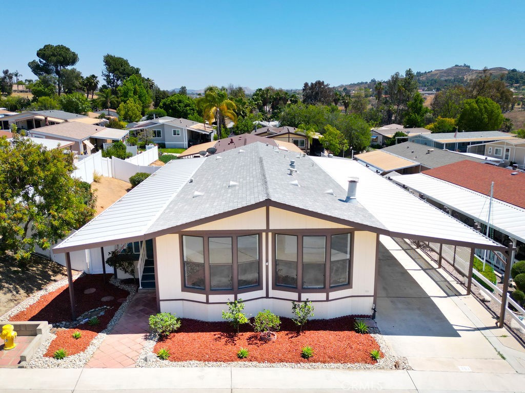 15181 Van Buren, Unit 262 Riverside, CA 92504 - Photo 48 of 48 a front view of a house with garden