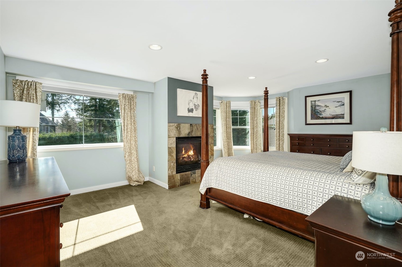 20628 Southeast 162nd Way Renton, WA 98059 - Photo 12 of 25 a bedroom with a bed and dresser with mirror