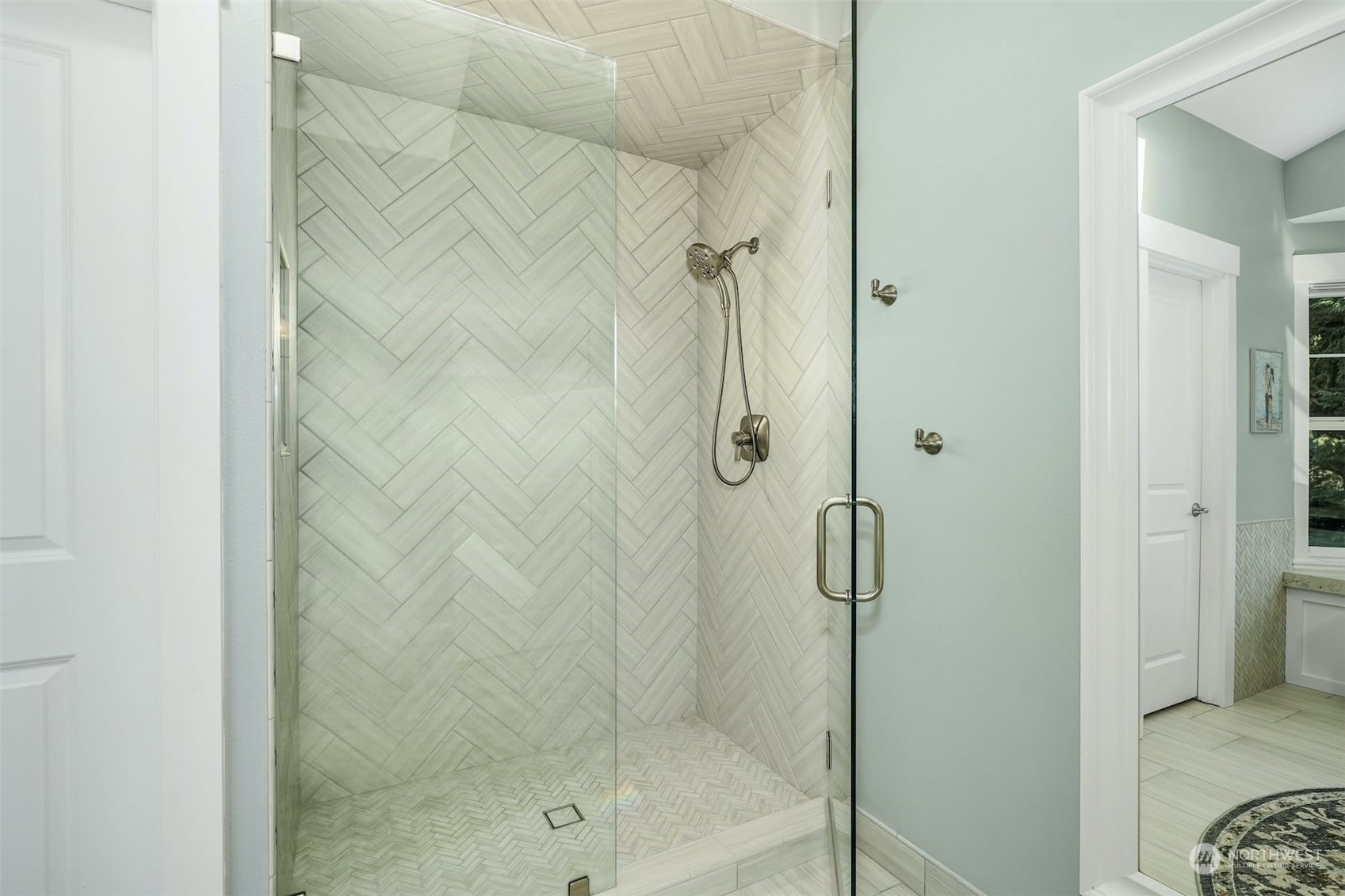 20628 Southeast 162nd Way Renton, WA 98059 - Photo 13 of 25 a bathroom with a glass shower door