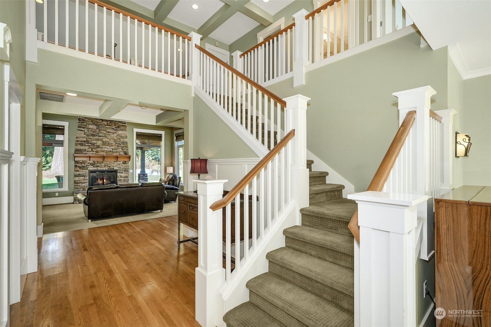 20628 Southeast 162nd Way Renton, WA 98059 - Photo 3 of 25 a view of staircase with lots of frames on wall and a window