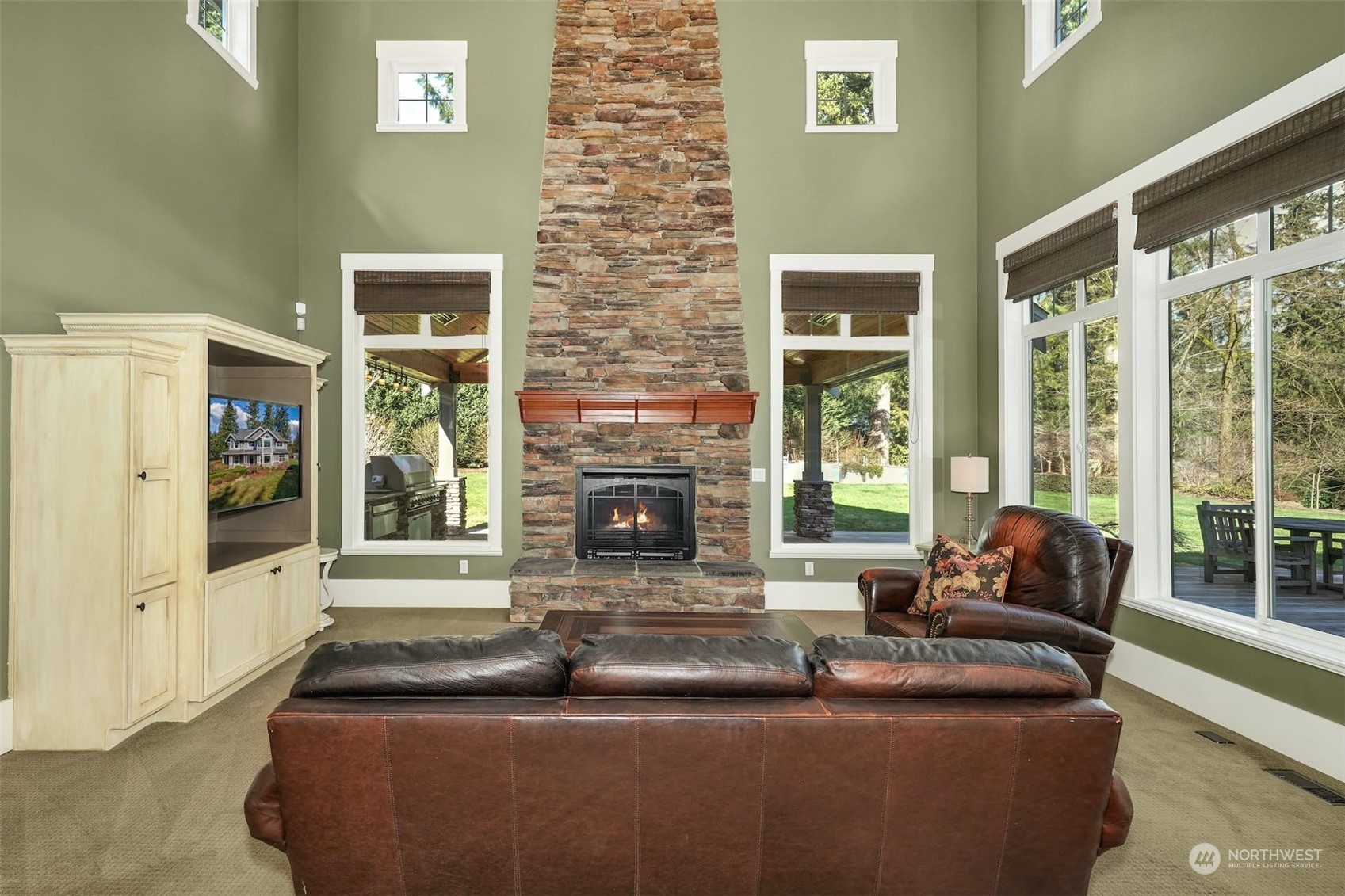 20628 Southeast 162nd Way Renton, WA 98059 - Photo 8 of 25 a living room with fireplace furniture and a large window