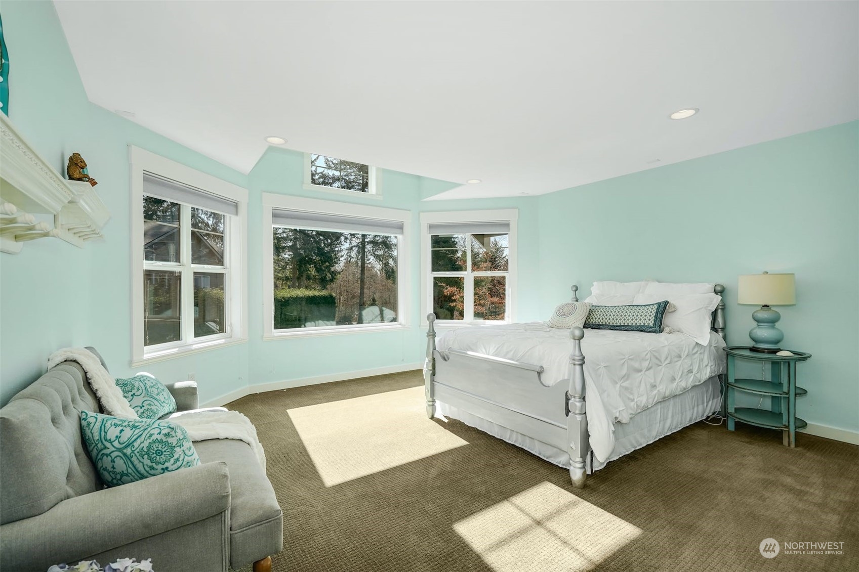 20628 Southeast 162nd Way Renton, WA 98059 - Photo 9 of 25 a bed room with a bed and a couch