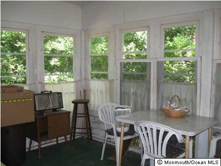 2111 Rogers Road Point Pleasant, NJ 08742 - Photo 2 of 3 a dining room with furniture and window