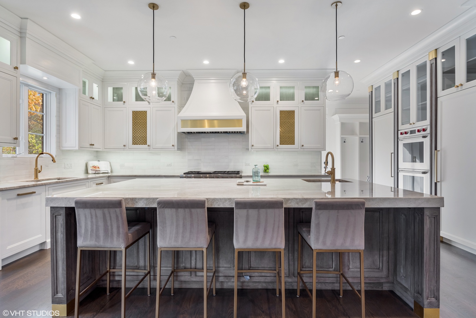 885 Private Road Winnetka, IL 60093 - Photo 8 of 35 a kitchen with cabinets a sink and chairs