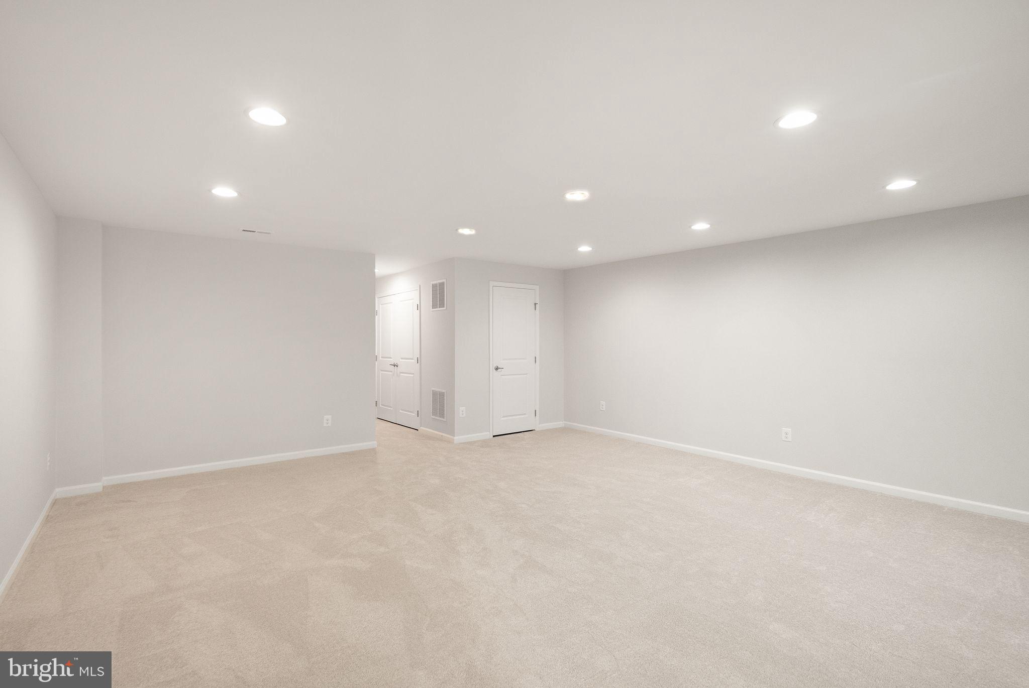 41688 McMonagle Square Aldie, VA 20105 - Photo 14 of 59 an empty room with a empty space and windows
