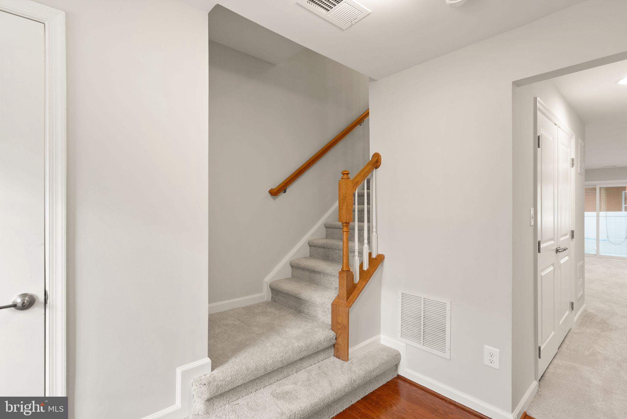 41688 McMonagle Square Aldie, VA 20105 - Photo 18 of 59 a view of entryway and hall with wooden floor