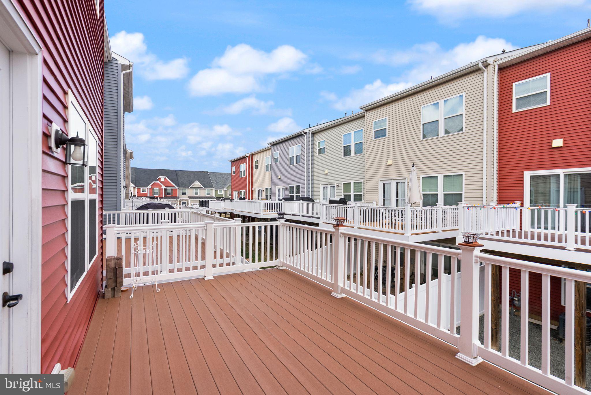 41688 McMonagle Square Aldie, VA 20105 - Photo 28 of 59 a view of a balcony with wooden floor