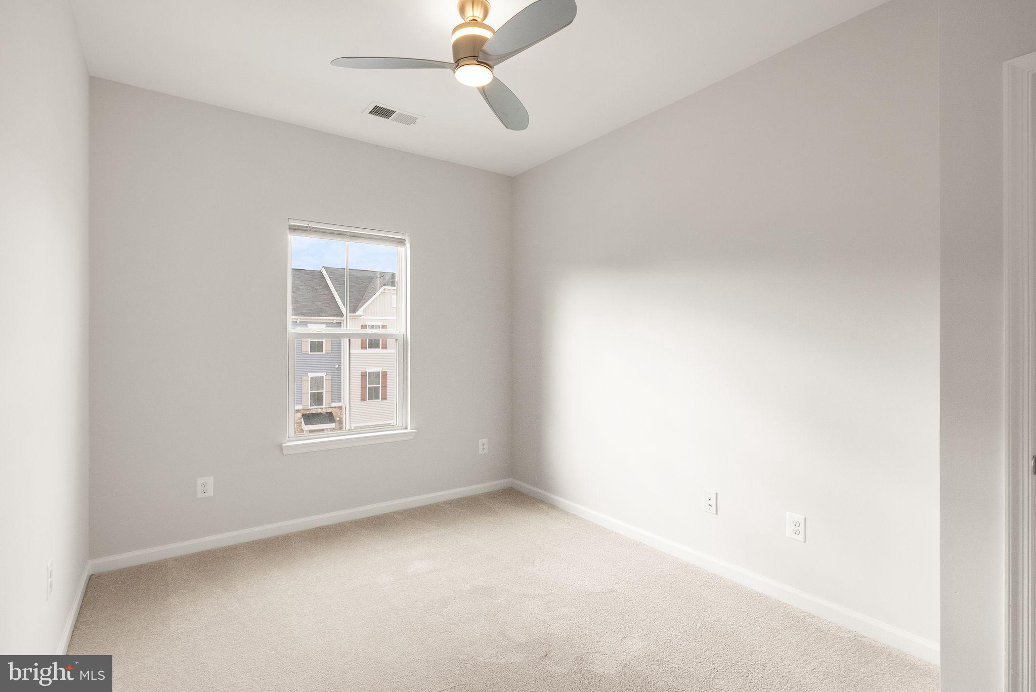 41688 McMonagle Square Aldie, VA 20105 - Photo 49 of 59 an empty room with windows