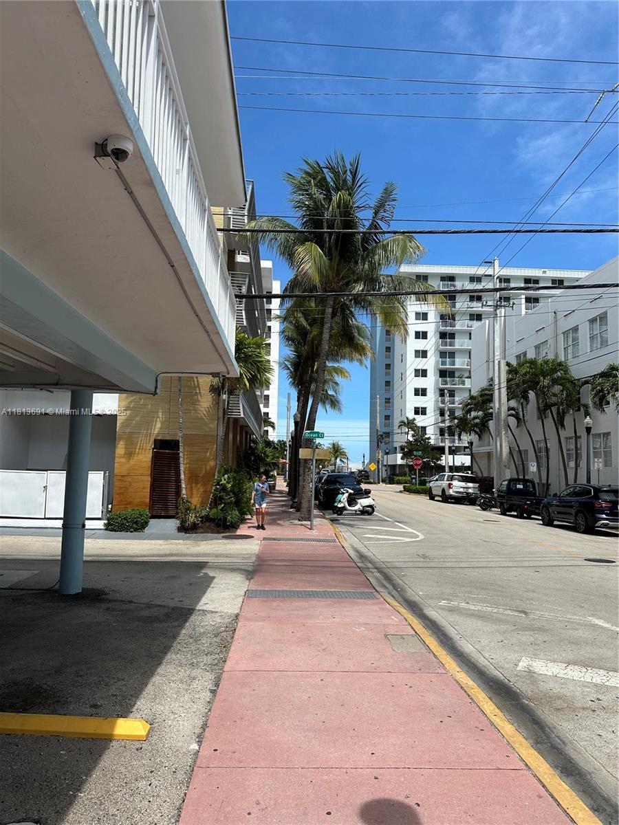 a view of a building with a street