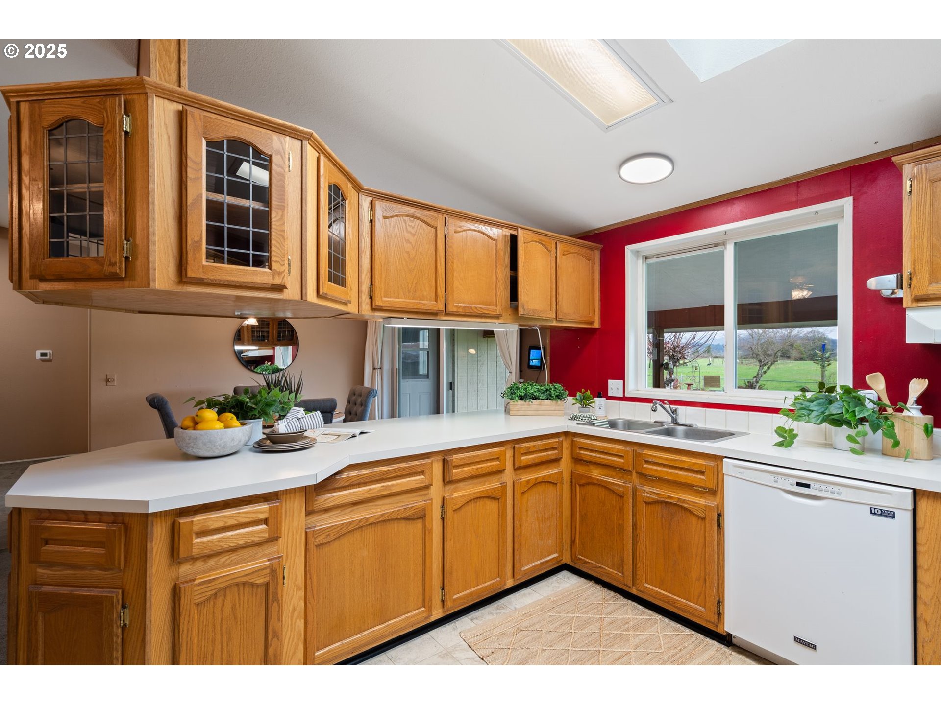 1720 Southwest Stringtown Road Forest Grove, OR 97116 - Photo 12 of 39 a kitchen with a sink window and cabinets