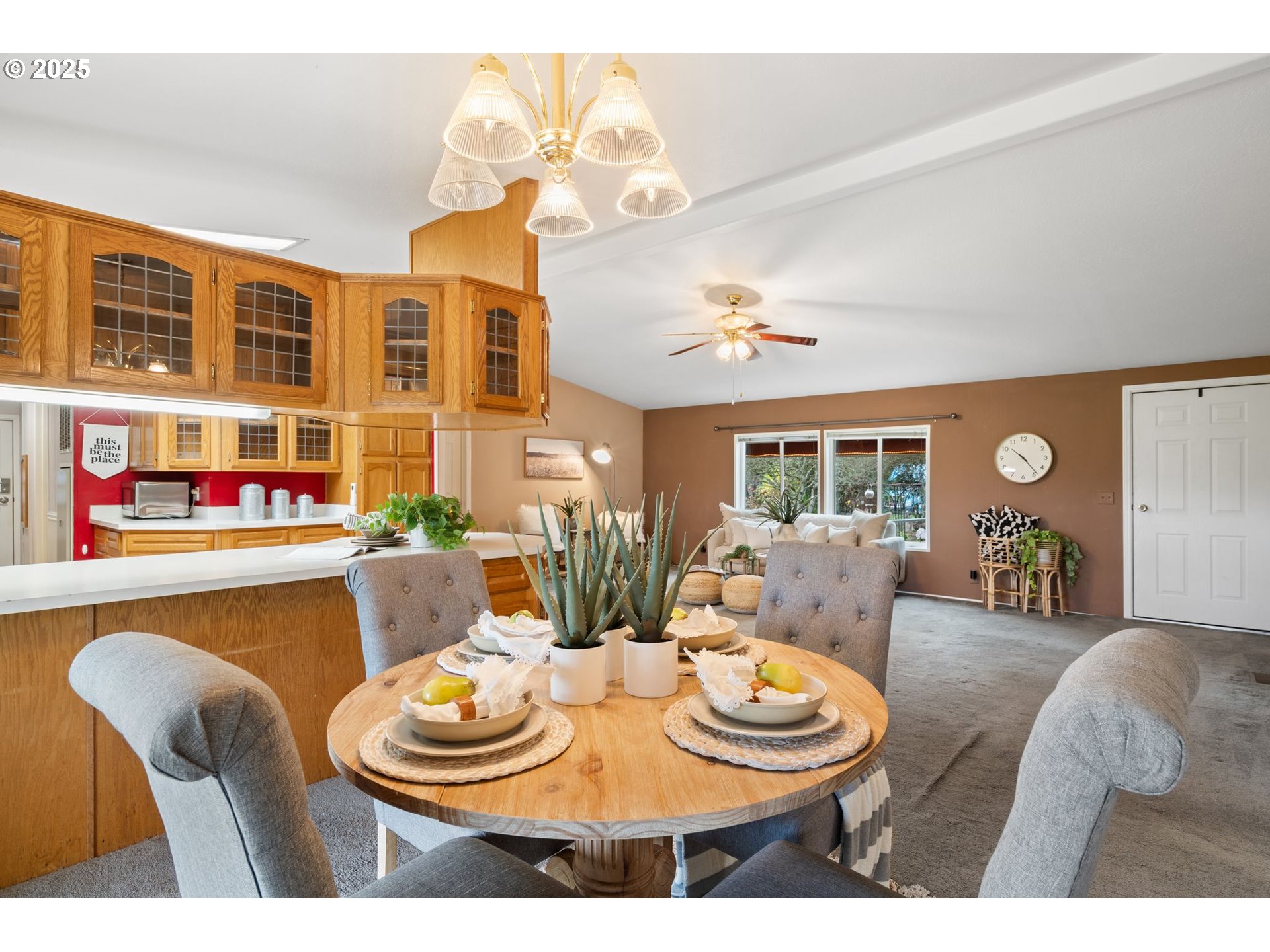 1720 Southwest Stringtown Road Forest Grove, OR 97116 - Photo 14 of 39 a dining room with furniture and a chandelier